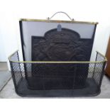 Hearth related items: to include a 19thC cast iron fireback with a crest motif 21''h 20''w