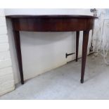 An early 19thC mahogany demi-lune hall table, raised on square,