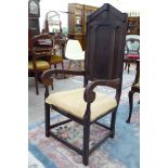 A mid 19thC Continental stained oak and fruitwood framed hall chair with a high panelled back,