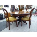 A modern reproduction of a Victorian Continental stained pine and other centre table,