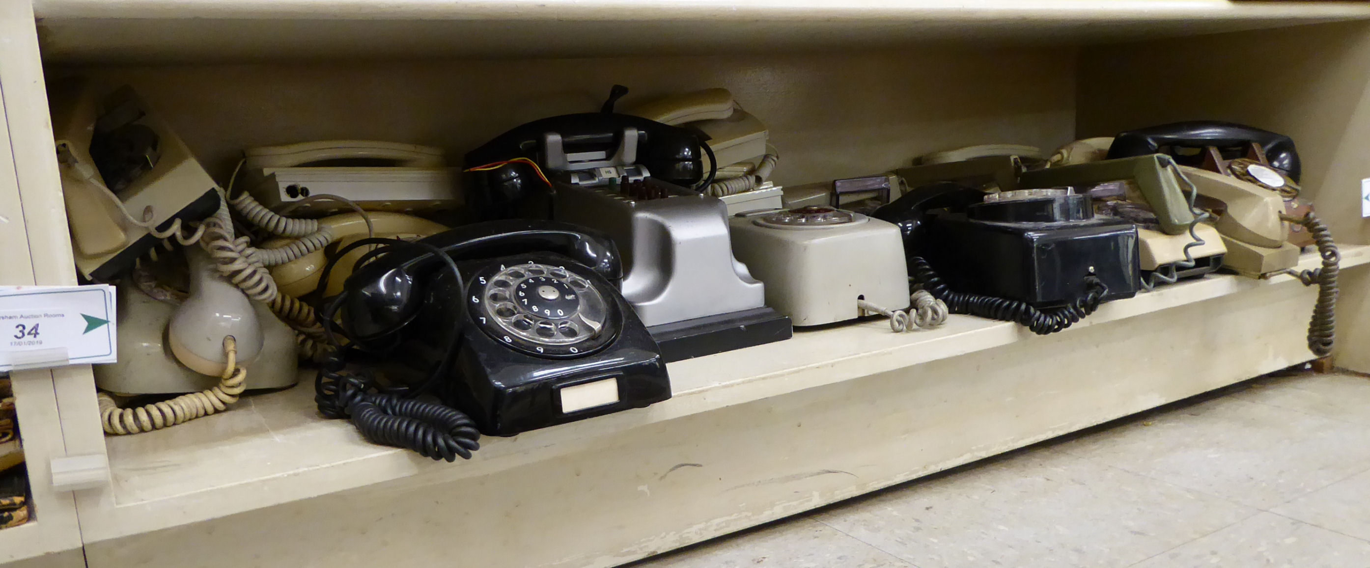 'Vintage' telephones: to include cream and black coloured plastic cased examples,