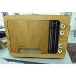 A mid 20thC satin mahogany finished cased KB Minor radio no.