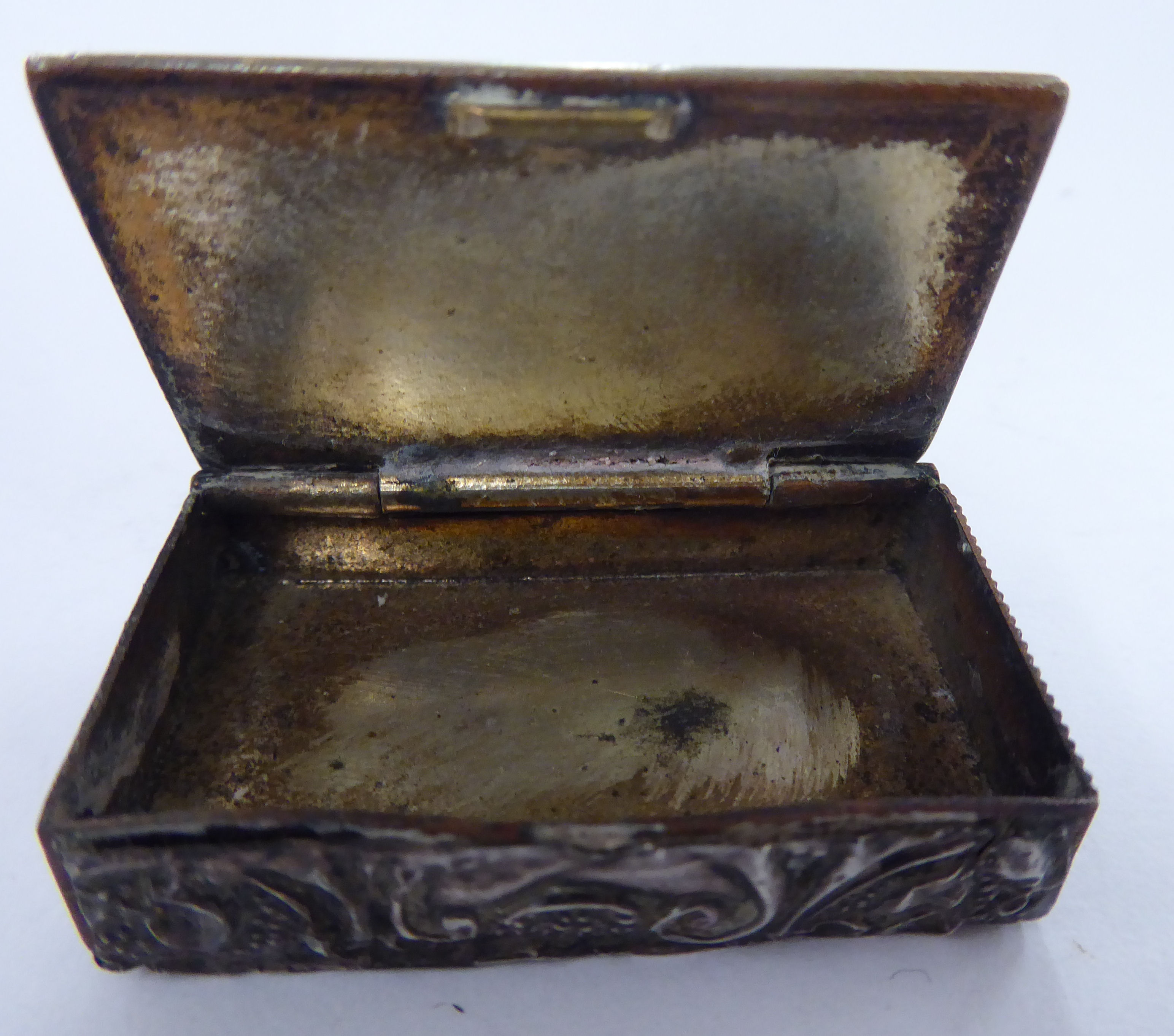 A Continental silver coloured metal vesta case, embossed with flora and scrolls, - Image 5 of 6