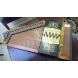 An early/mid 20thC painted wooden zither CA