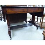 A Regency mahogany sofa table with two frieze drawers,