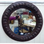 An early 20thC mirror, set in wide,