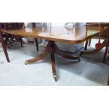 A modern crossbanded yew wood coffee table, the rectangular top with rounded corners,