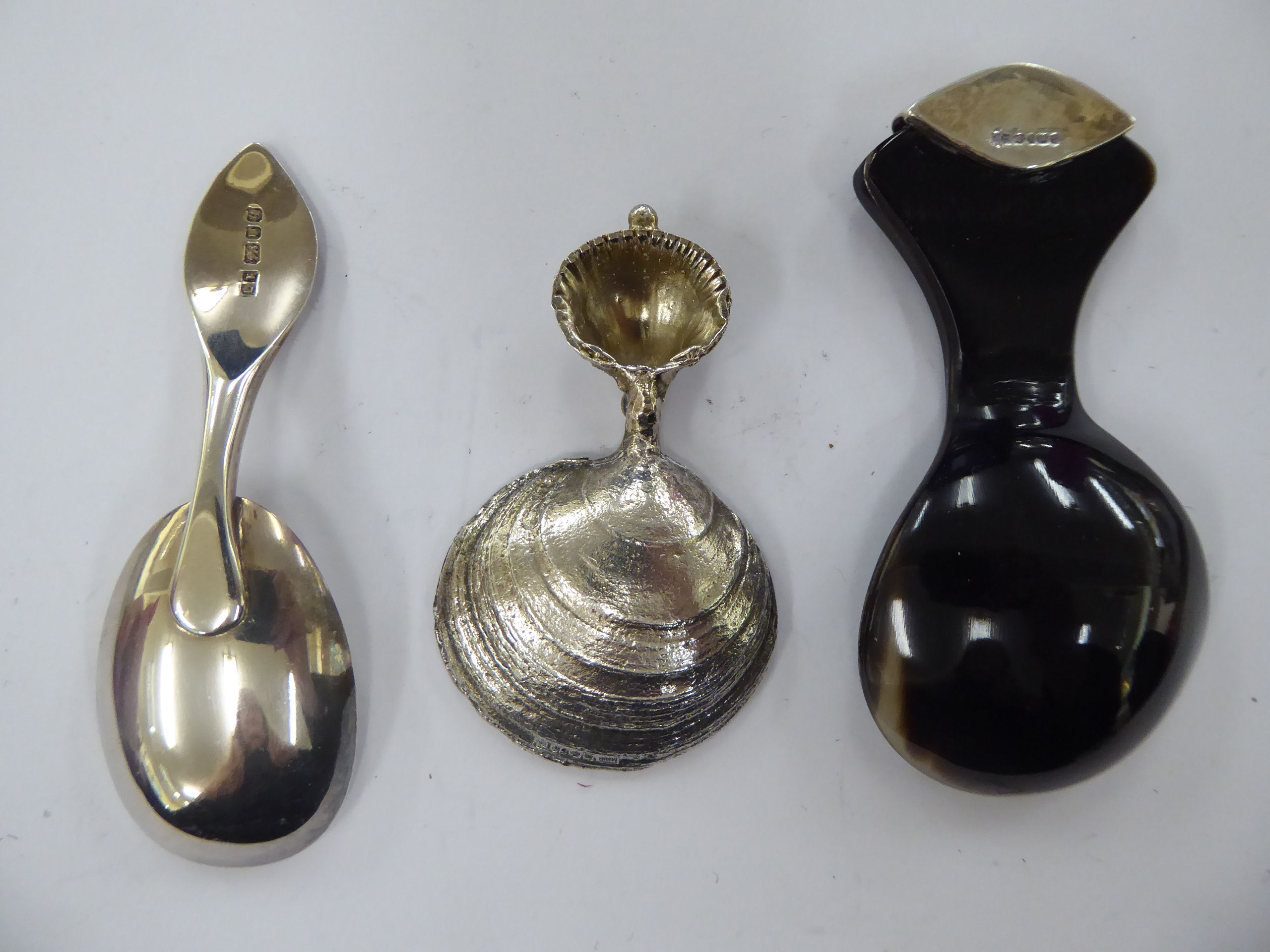 A cast silver caddy spoon, the bowl fashioned as a pearl in an oyster shell, - Image 2 of 2