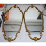 A pair of 'antique' inspired mirrors,