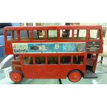 A mid 20thC scratch built and red painted model of a London bus 16''h 25''L RSM