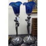 A pair of Art Nouveau inspired silvered metal table lamps,