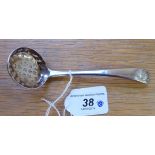 A William IV silver sifter spoon with a decoratively pierced,