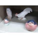 Four Royal Copenhagen porcelain model birds, viz. an owl No.1741 3.5''h; a cockerel No.1127 4.