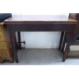 A mid 19thC mahogany card table, the foldover top on a rear gateleg action,