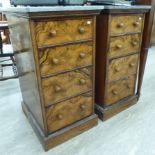 A pair of early 20thC figured walnut pedestal bedside chests,