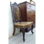 An Edwardian stained beech framed side chair, the foliate fabric upholstered,