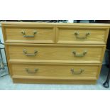 A G-Plan oak finished dressing chest with two short/two long drawers,