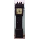 A late 18thC profusely carved, dark stained oak longcase clock,