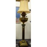 A late Victorian brass oil lamp (later converted to electricity) with a Corinthian capital,