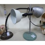 An early 20thC desk lamp with an alloy shade,