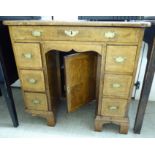 A late 18thC boxwood inlaid walnut twin pedestal, seven drawer lady's desk,