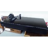 An Orbitsound sound bar with a remote control SR