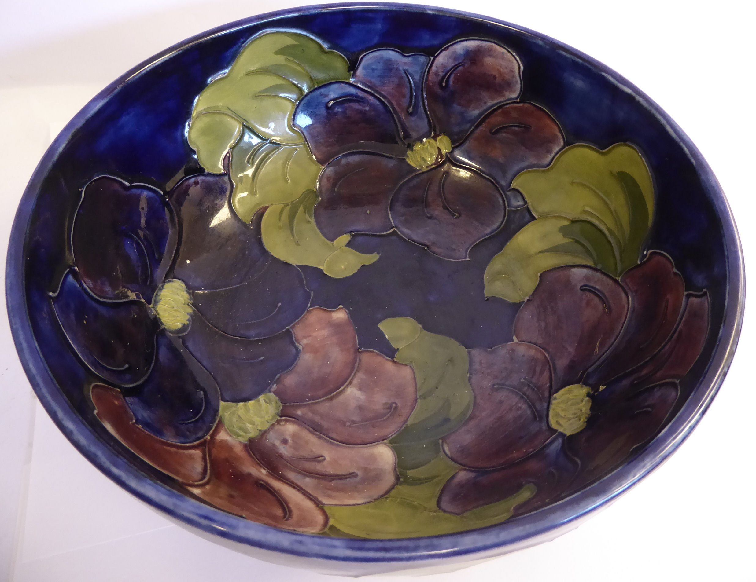 A Moorcroft pottery footed fruit bowl, decorated in tubeline in a version of the Anemone design, - Image 5 of 8