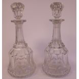 A pair of Georgian style crystal mallet shaped decanters with blown stoppers, allover slice,