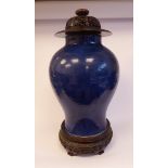 A late 18th/early 19thC Chinese blue glazed porcelain vase of waisted baluster form with an upstand