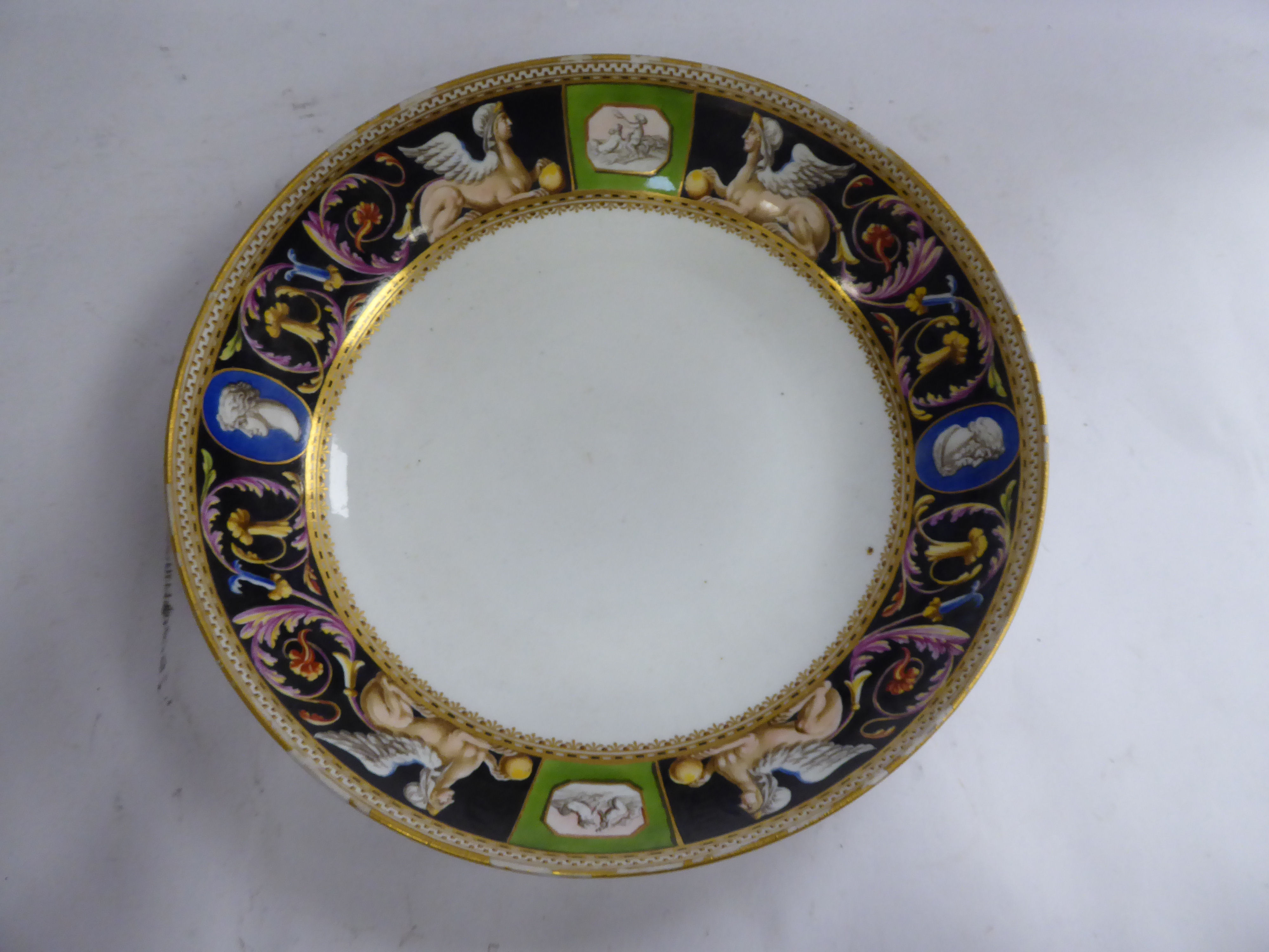 A late 19thC Continental ivory glazed porcelain dish,