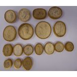 Eighteen 19thC moulded oval plaster cameos, in card mounts, variously featuring classical groups,