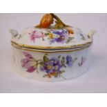 A 20thC Bavarian porcelain oval dish, the domed cover having a moulded soft fruit finial,