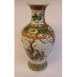 A late 19thC Chinese porcelain vase of baluster form, having a narrow neck and flared rim,