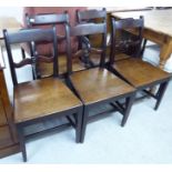 A set of five George III oak and elm framed bar back dining chairs,