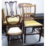 Four dissimilar early 20thC chairs: to include a Victorian style child's beech framed nursery chair