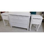 A modern white painted four drawer dressing chest,