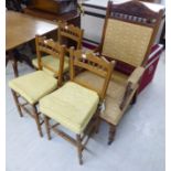 An Edwardian matched four piece stained beech framed salon suite comprising an upholstered