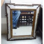 A mid 20thC 'antique' inspired mirror,