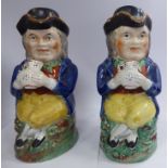 A pair of mid 19thC Staffordshire pottery Toby jugs,