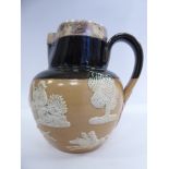 A Royal Doulton green and brown glazed stoneware harvest jug of bulbous form with a wide neck,