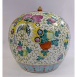 A late 19thC Chinese porcelain vase of bulbous form, having a bud finial on the flush fitting cover,