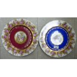 Two similar mid 20thC Vienna porcelain plates, decorated with pictorial cartouches and gilding,