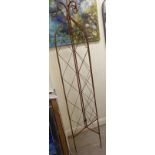 A cast latticed iron three-fold garden spire 63''h RAM