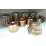 Late 19th/early 20thC copper moulds: to include a set of three doughnut shaped and four of