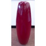 A Fellini opaque oxblood coloured glass pendant light shade of slender baluster form 26''h