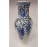 A Royal Copenhagen porcelain vase of slender bulbous form, having a narrow neck and flared rim,