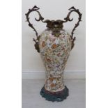 A modern 19thC style Continental and ornately cast brass mounted porcelain standing vase of waisted,