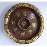 A Georgian rust coloured, lacquered, turned wooden Pope Joan board of shallow bowl design,