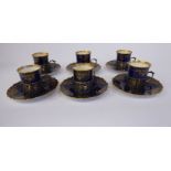 A set of six Aynsley bone china coffee cans and saucers,