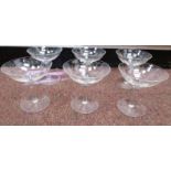 A set of six Champagne glasses with fine wheel engraved ornament